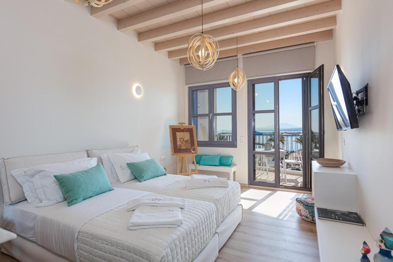 V77 Seafront Suites Ретимно Экстерьер фото